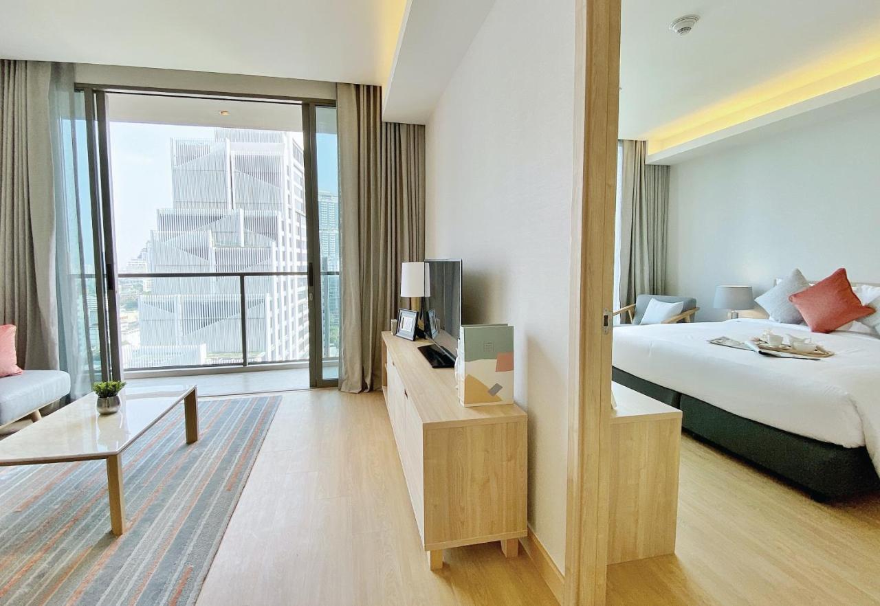Oakwood Suites Bangkok Kültér fotó Deluxe Suite